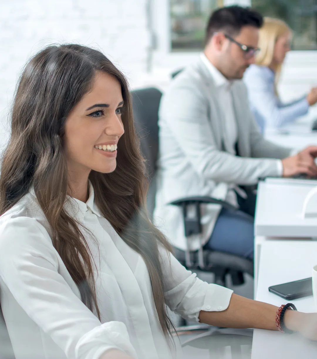 people working at desks